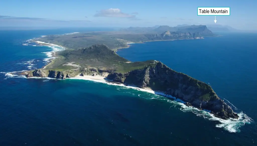 Scenic aerial of Cape Peninsula stretching from Table Mountain to Cape Point.